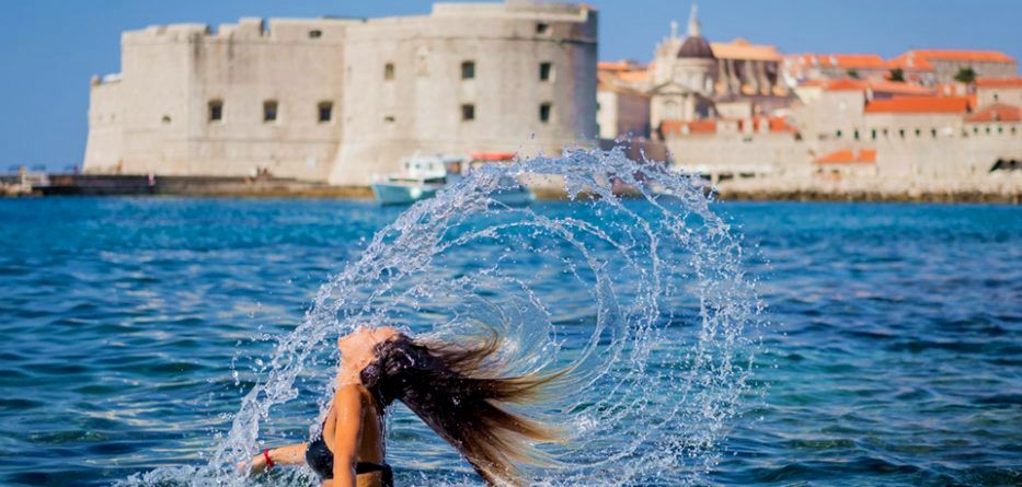woman swimming when its too hot in Dubrovnik 